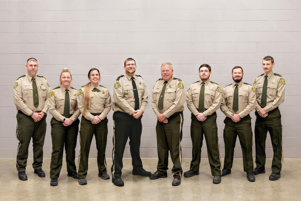 Group of Deputies standing next to each other and smiling